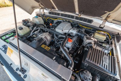 1995 white Land Rover Range Rover County engine bay.