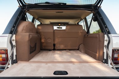1995 white Land Rover Range Rover County rear cargo area.