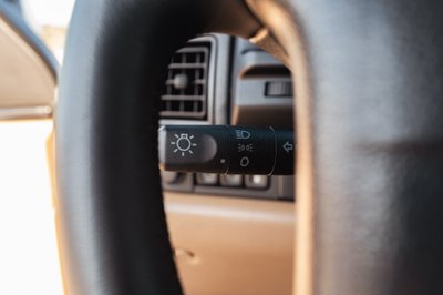 1995 Land Rover Range Rover County headlight stalk and dashboard detail.