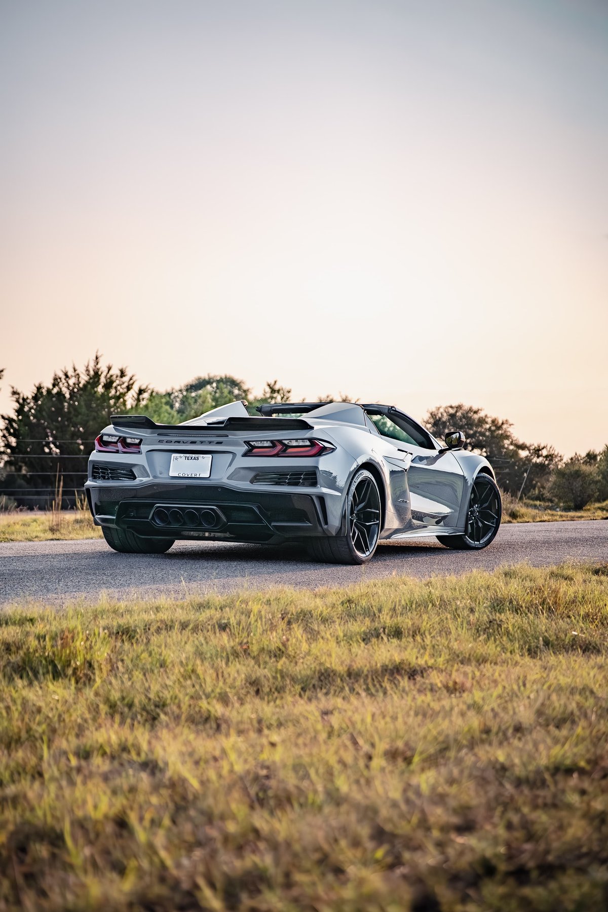 2025 Corvette Z06 in Sea Wolf Gray, with black aero trim and dark rims.