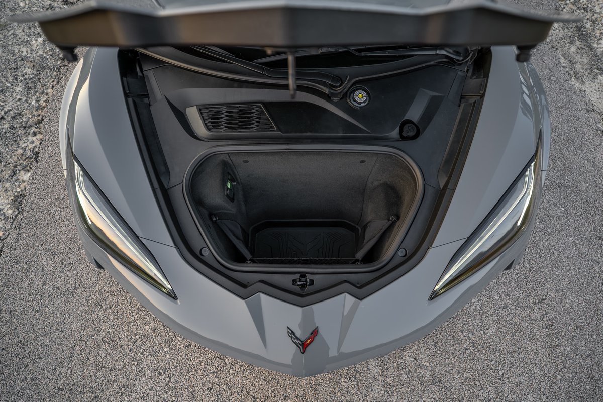 2025 Chevrolet Corvette Z06 in Sea Wolf Gray with open front trunk storage.