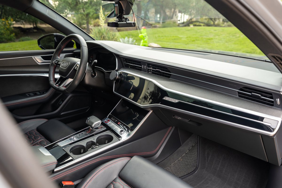 Nardo Grey 2022 Audi RS6 interior. Red stitching on leather seats and shifter.