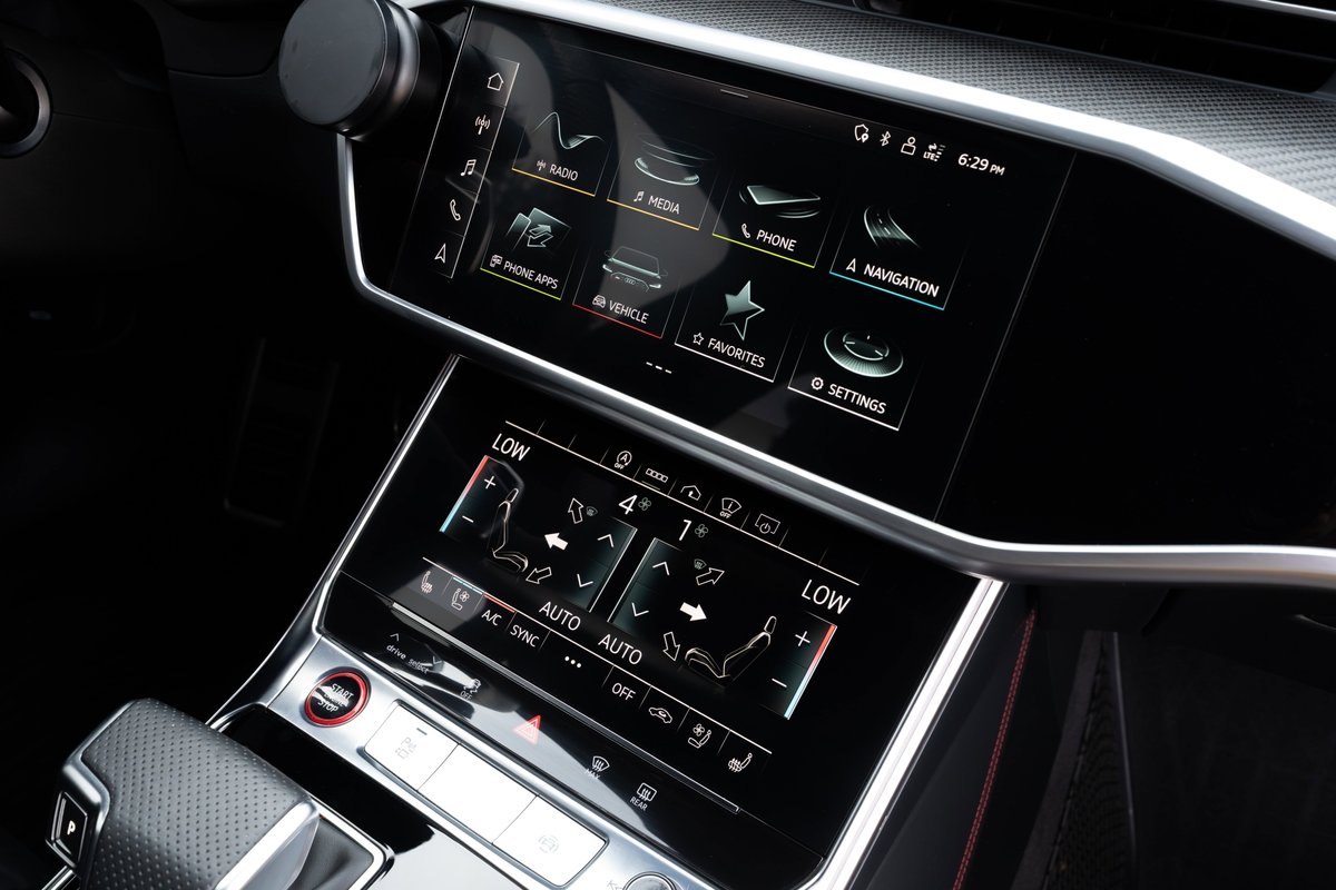 2022 Audi RS6 in Nardo Grey with touch screen climate and infotainment controls.