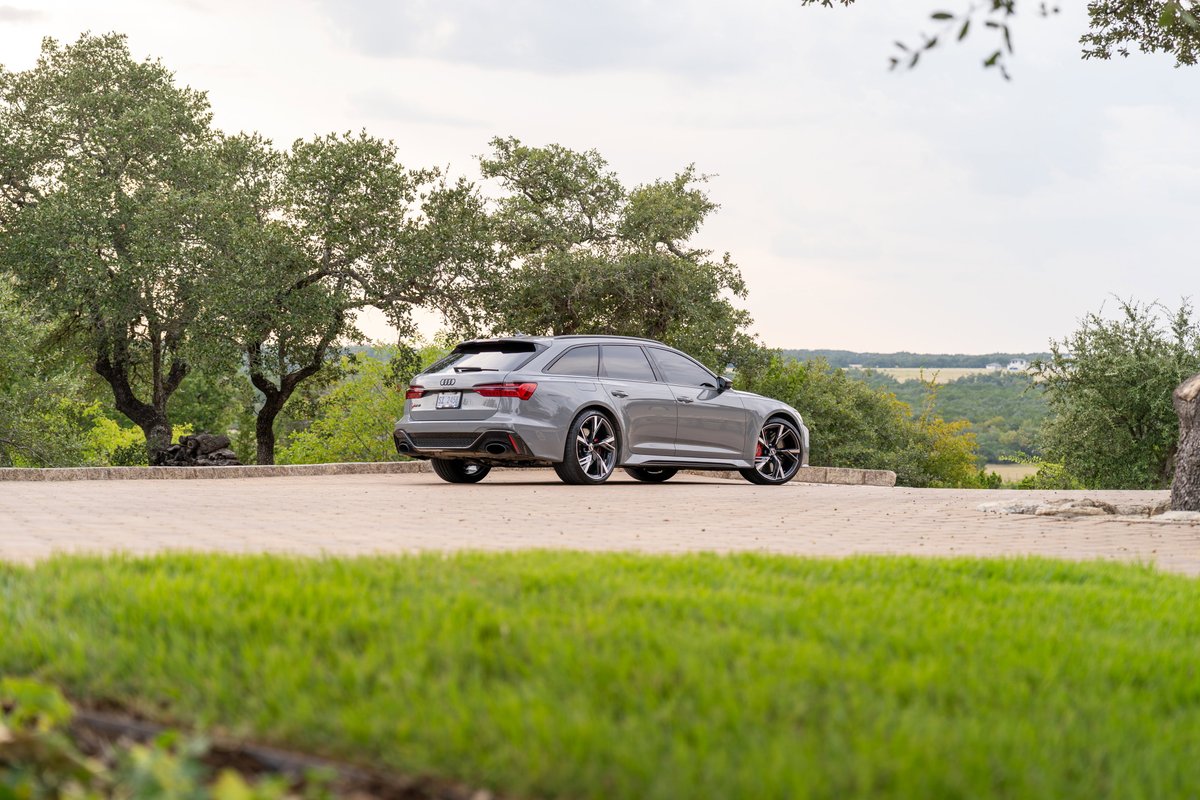 Nardo Grey 2022 Audi RS6 Avant with dark multi-spoke rims parked on paved ground.