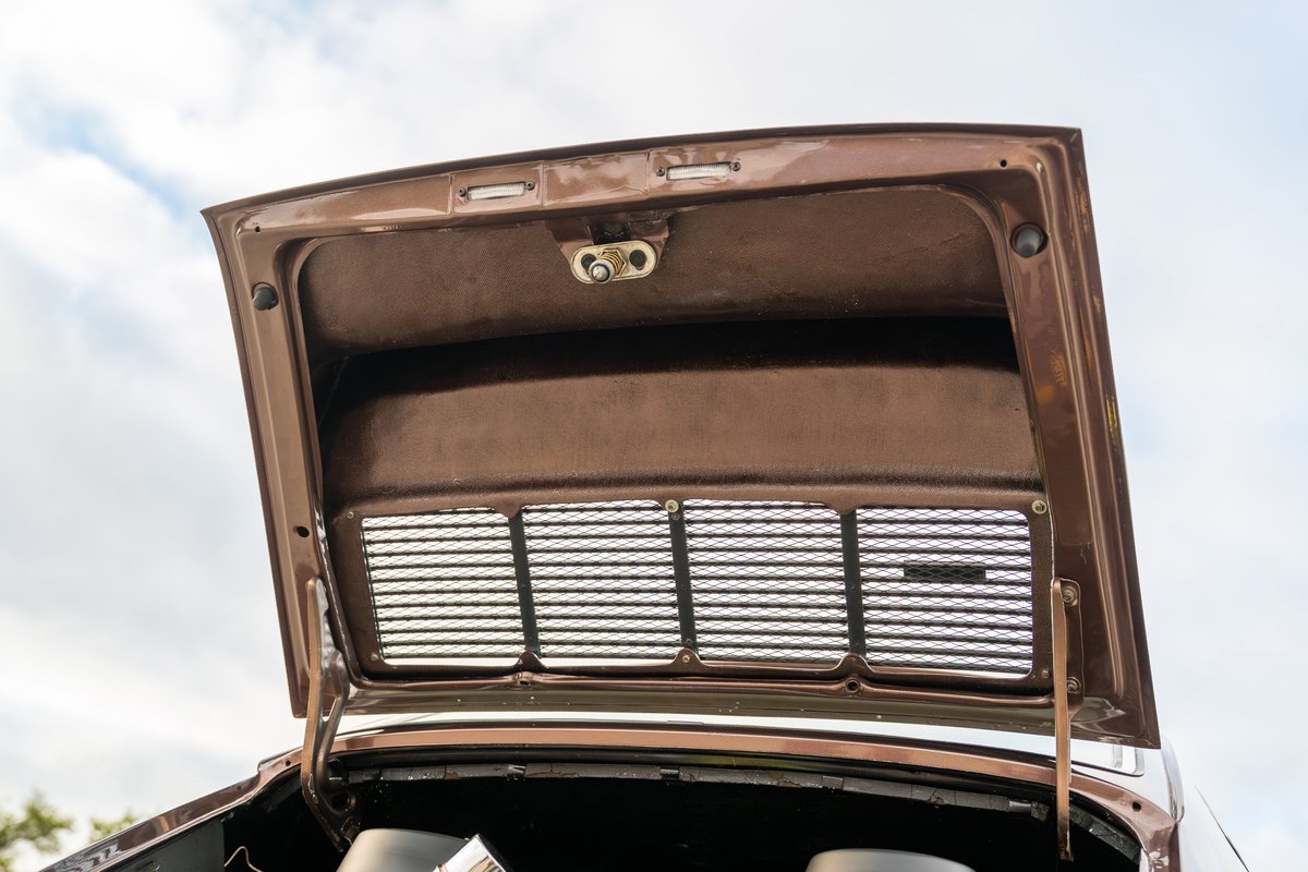 1975 Porsche 911 Carrera frunk interior, copper brown metallic finish.