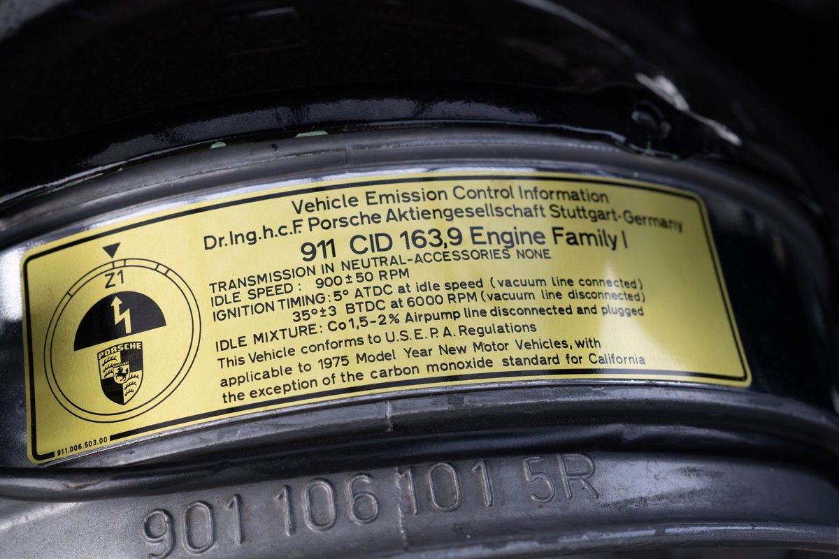 1975 Porsche 911 Carrera VIN decal with "911 CID 163.9 Engine Family I" text.