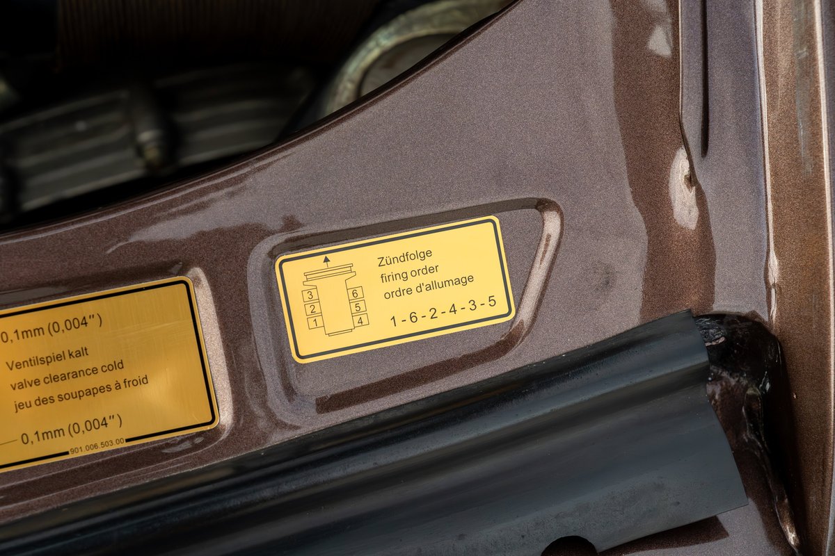 1975 Porsche 911 Carrera copper brown metallic engine bay firing order sticker.