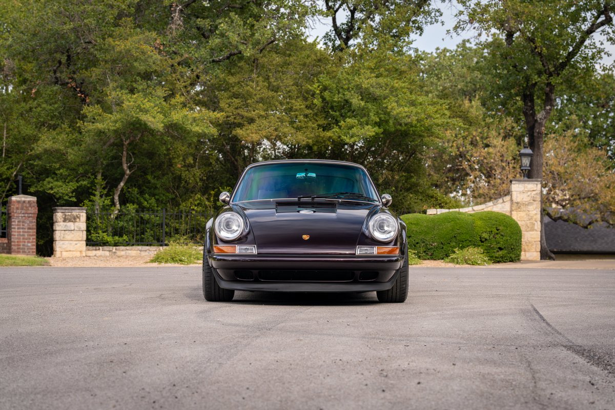 Aubergine Metallic 1990 Singer Porsche 911 front view.