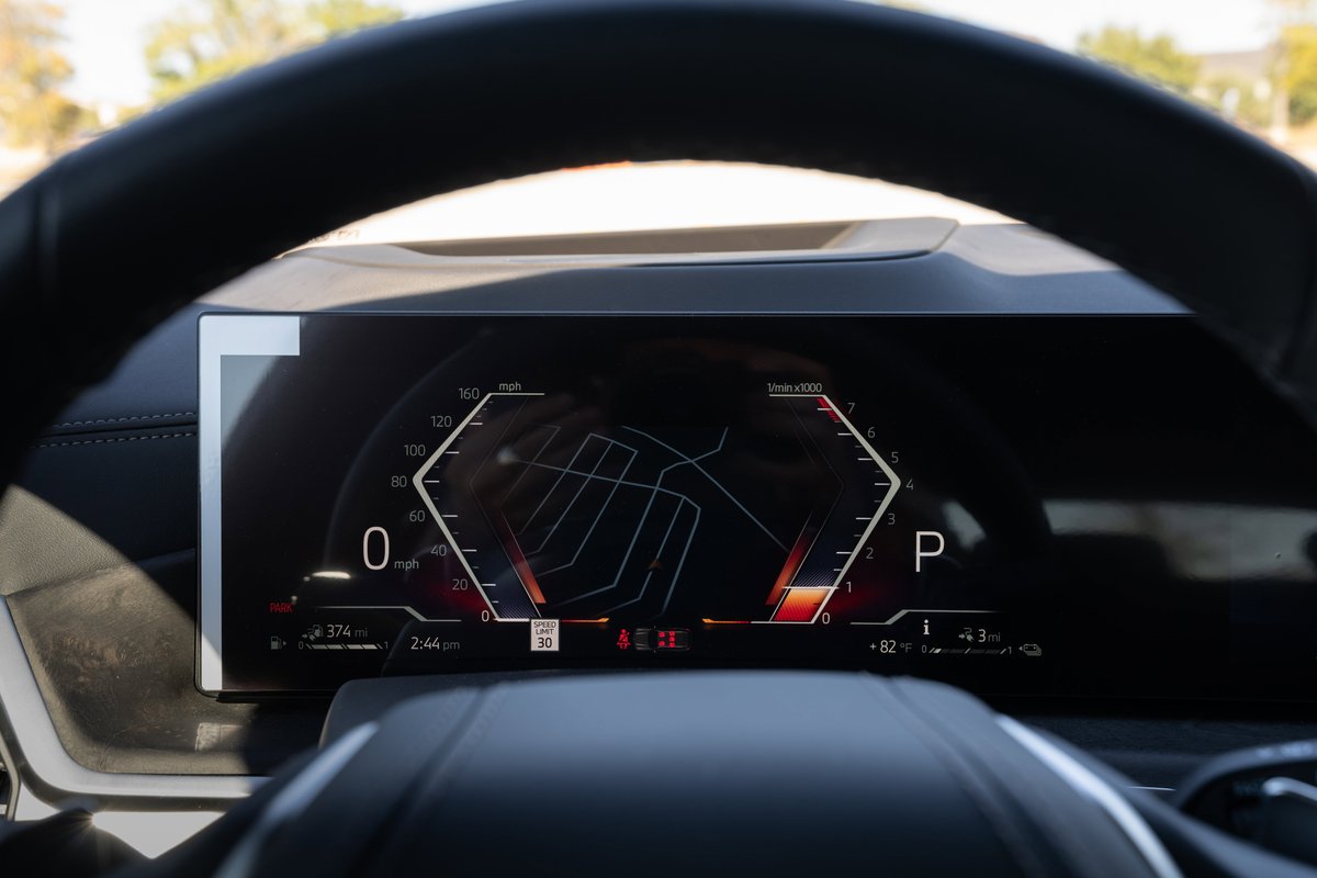 2026 BMW X5 digital dashboard with navigation and speed display.