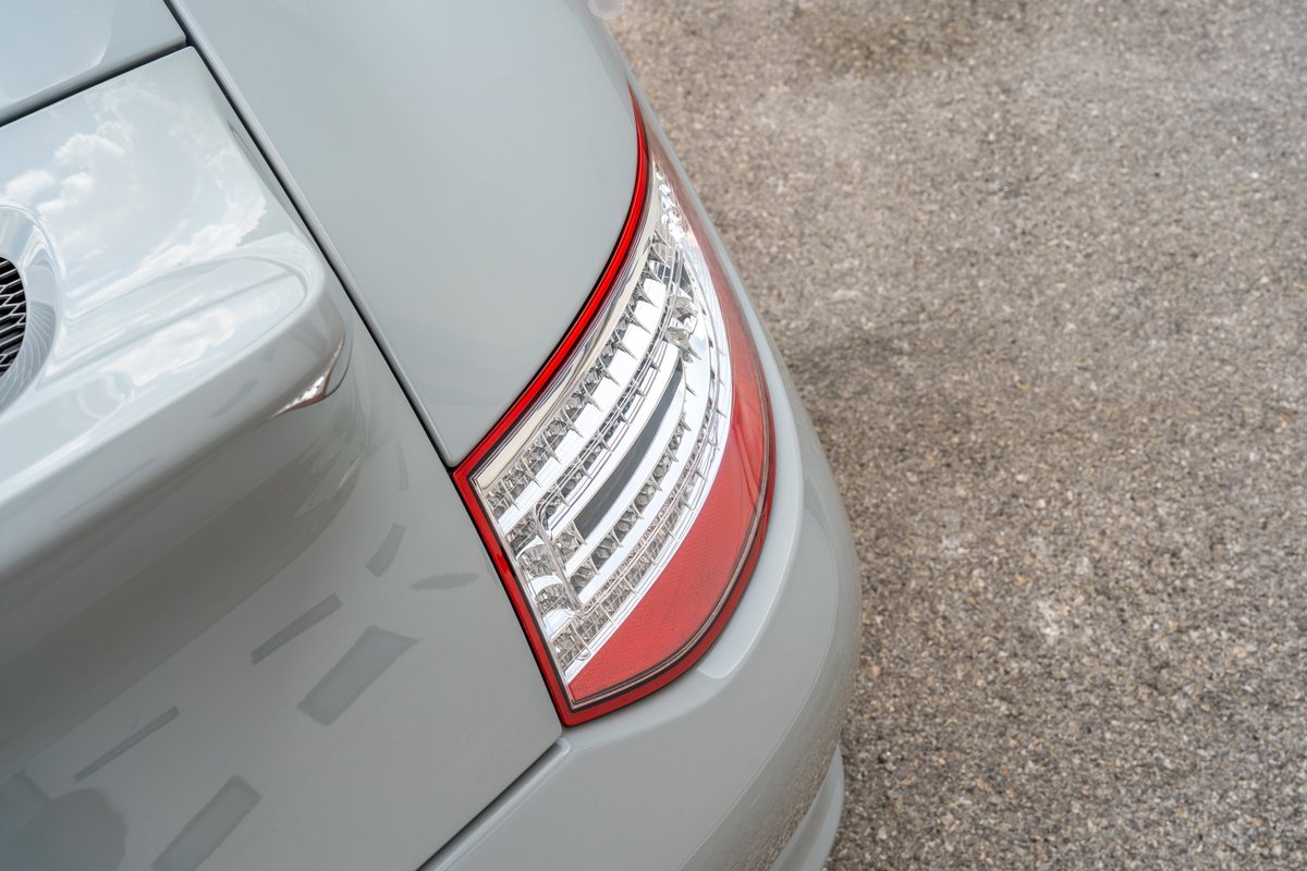 2010 Porsche 911 Sport Classic in gray, showing the taillight and body panel detail.