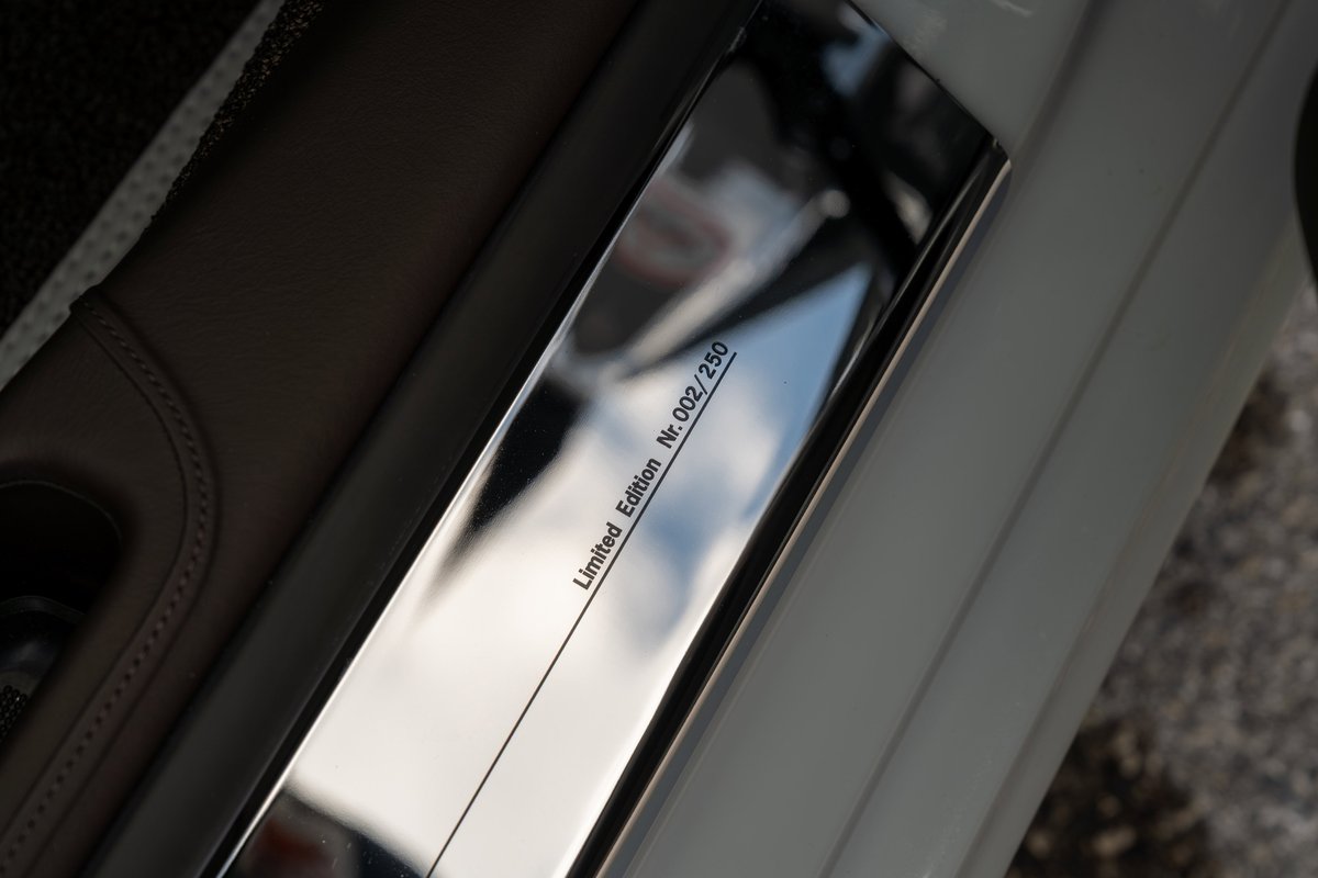 2025 Porsche 911 Sport Classic, limited edition plaque "Nr. 002/250" on chrome door sill trim.