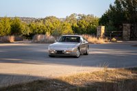 Silver 1987 Porsche 944 Turbo S with alloy rims and black trim.
