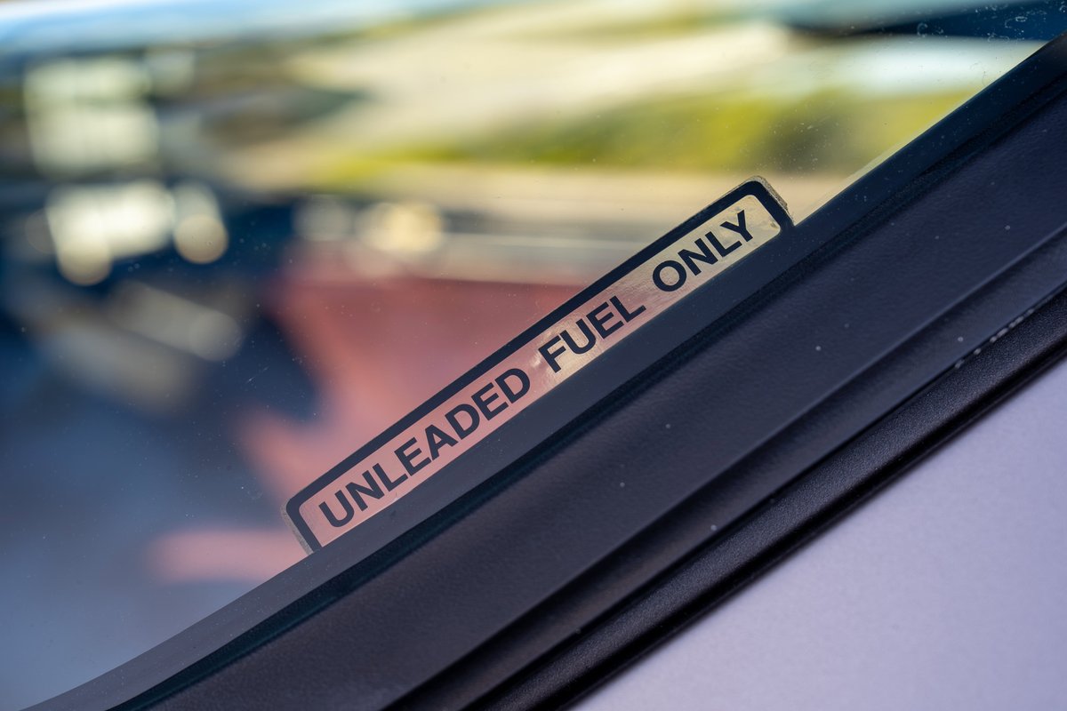 1987 Porsche 944 Turbo S silver windshield decal reads "Unleaded Fuel Only".