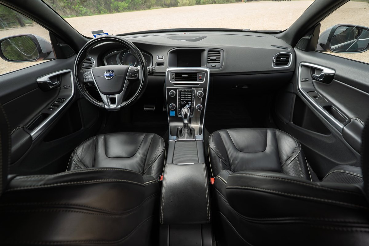2015 Volvo V60 R-Design Polestar interior. Black leather seats, steering wheel, dash.