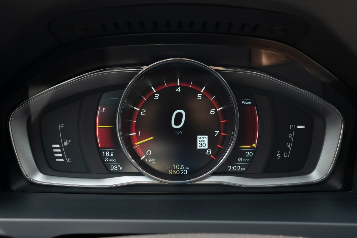 Digital dashboard of a black 2015 Volvo V60 R-Design Polestar, displaying speed, fuel, and ODO.