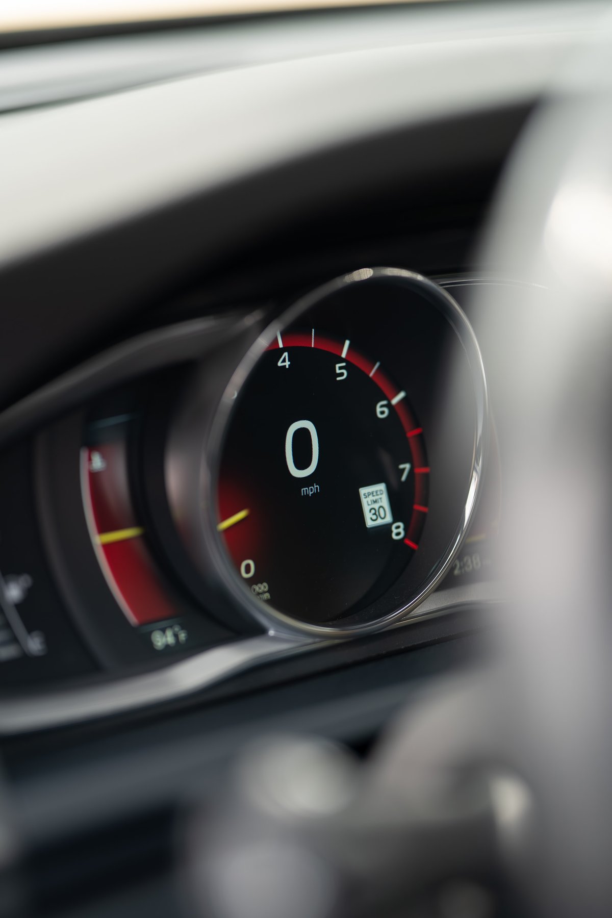 2015 Volvo V60 R Design Polestar: Close-up of digital speedometer showing 0 mph and 30 mph speed limit indicator.