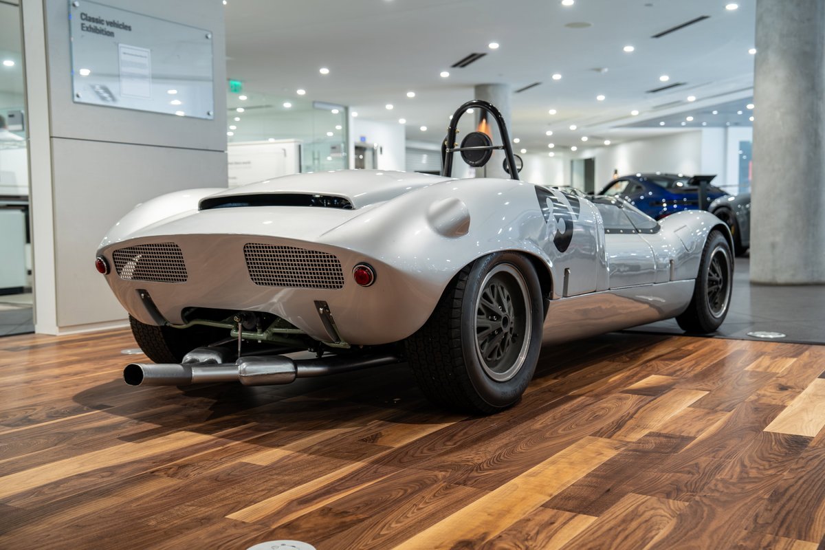 1964 Elva Porsche 4-Cam, silver, open-top race car with black rims.