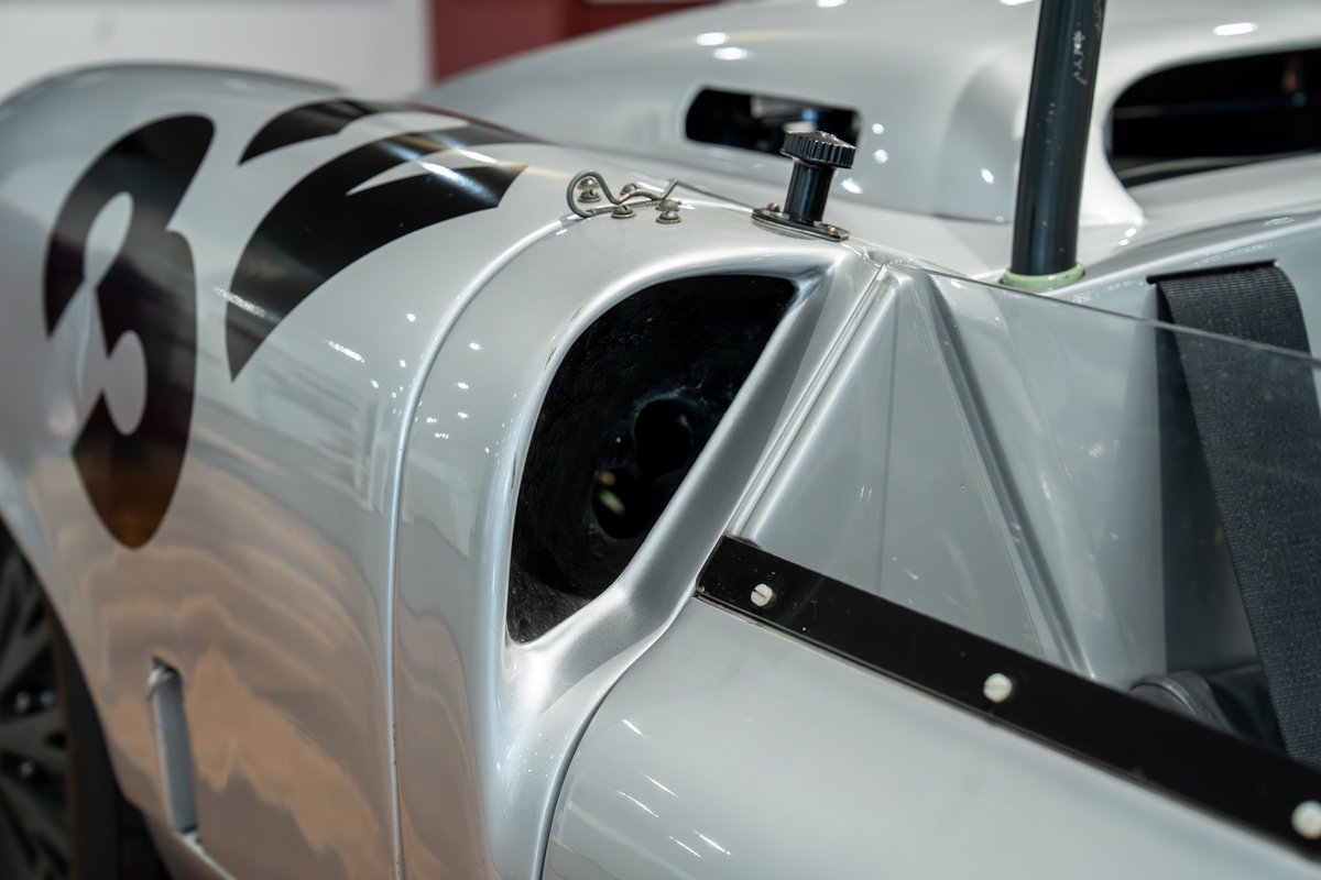 1964 Elva Porsche 4-Cam race car in silver with black '36' livery and a rear air intake.