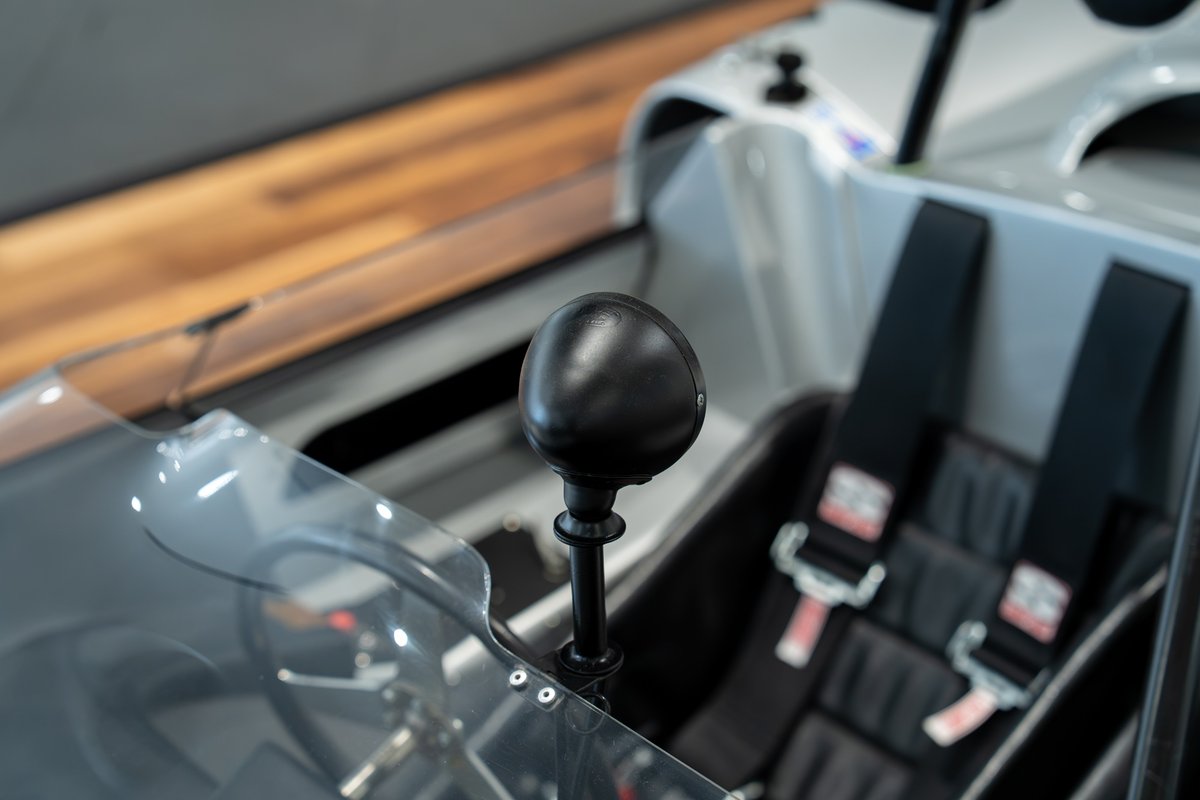Close up of a 1964 Elva Porsche 4-Cam's shifter and racing seats.
