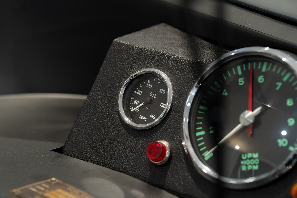 Classic dashboard with Smiths oil gauge and tachometer in a 1964 Elva Porsche 4-Cam.