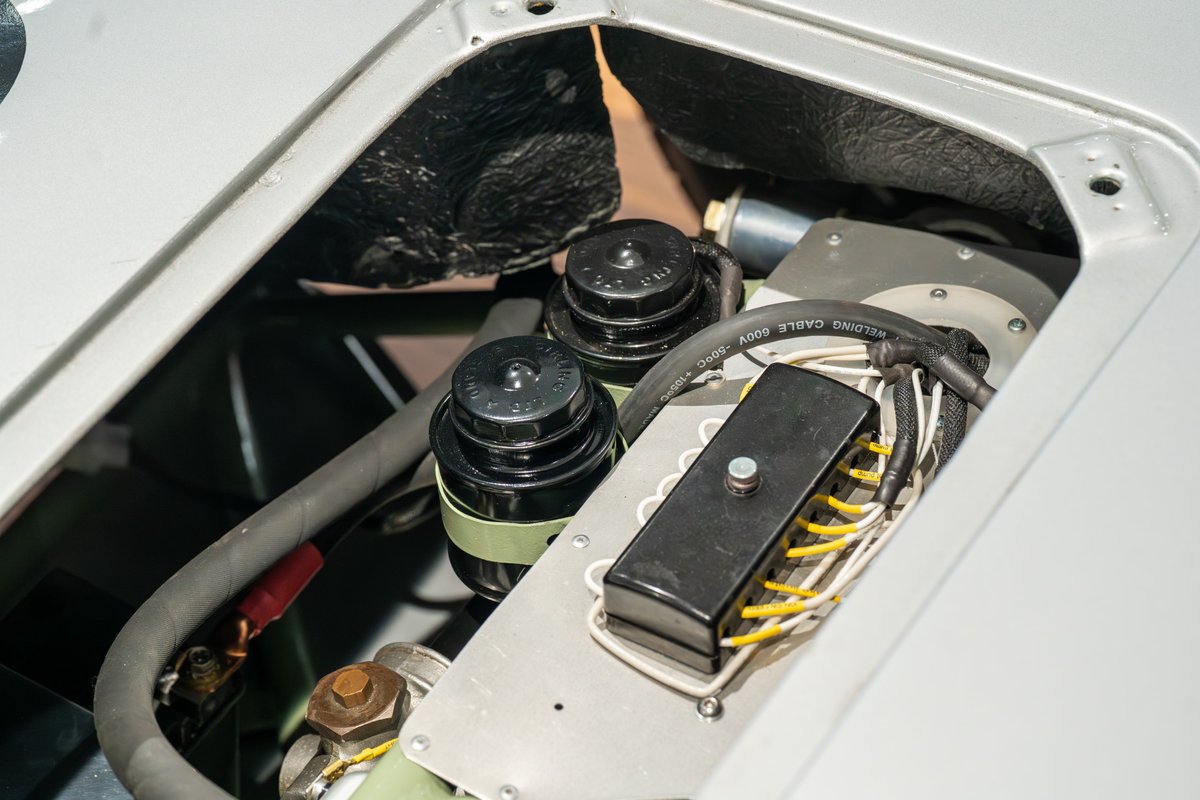 1964 Elva Porsche 4-Cam engine bay: Close-up of electrical components and wiring.