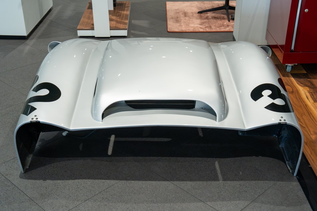 Silver 1964 Elva Porsche 4-Cam with black racing numbers "2" and "3" livery.