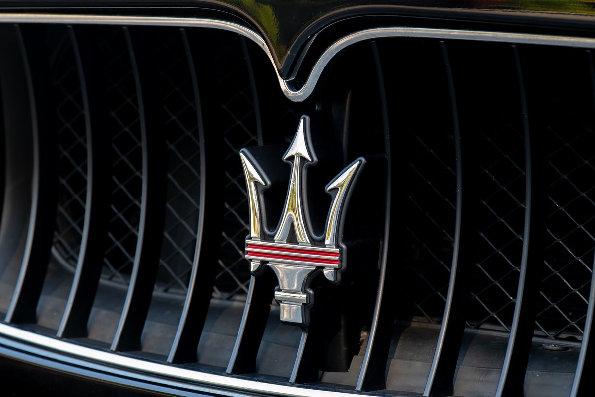 Maserati GranTurismo grille with trident emblem and chrome trim.