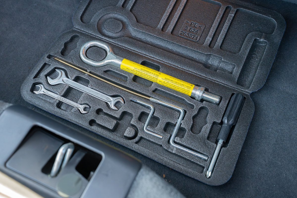 2016 Maserati GranTurismo spare tire tool kit.