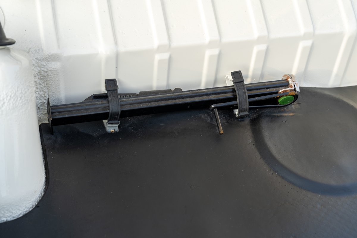 1974 Porsche 914 Can-Am's jack and lug wrench secured in trunk.