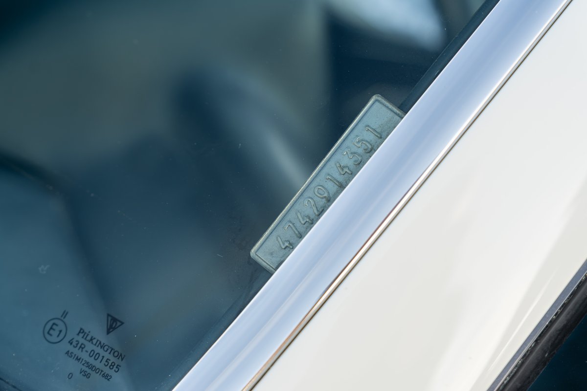 Close-up of a 1974 Porsche 914 VIN plate with "CREAMSICLE" livery.