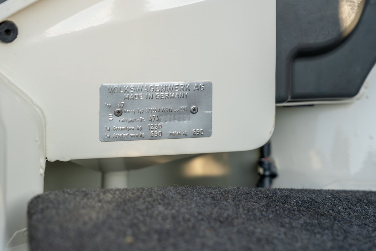 Close-up of a VIN plate on a white 1974 Porsche 914 Can-Am LE.