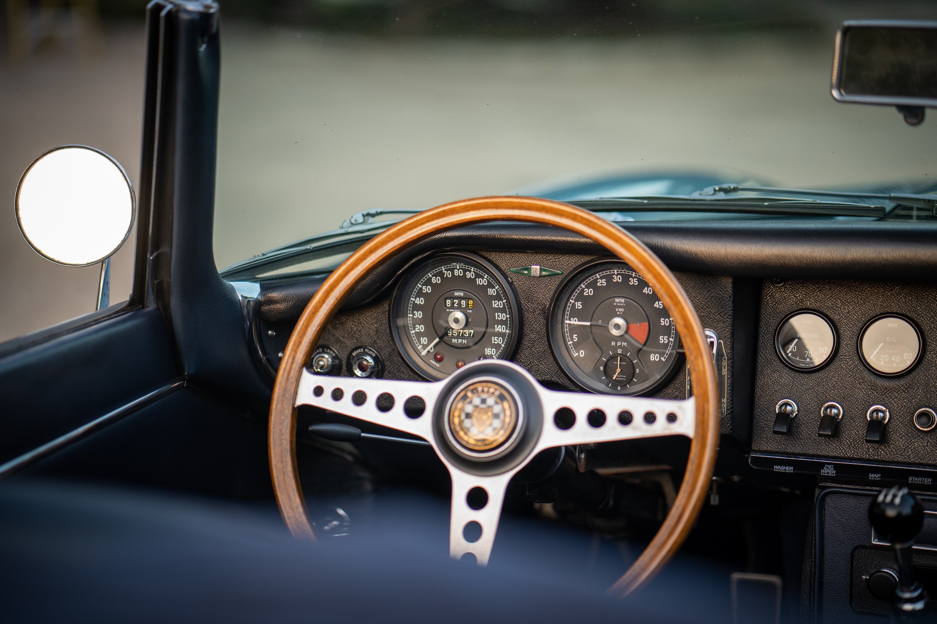 1966 Jaguar XKE interior with wooden steering wheel