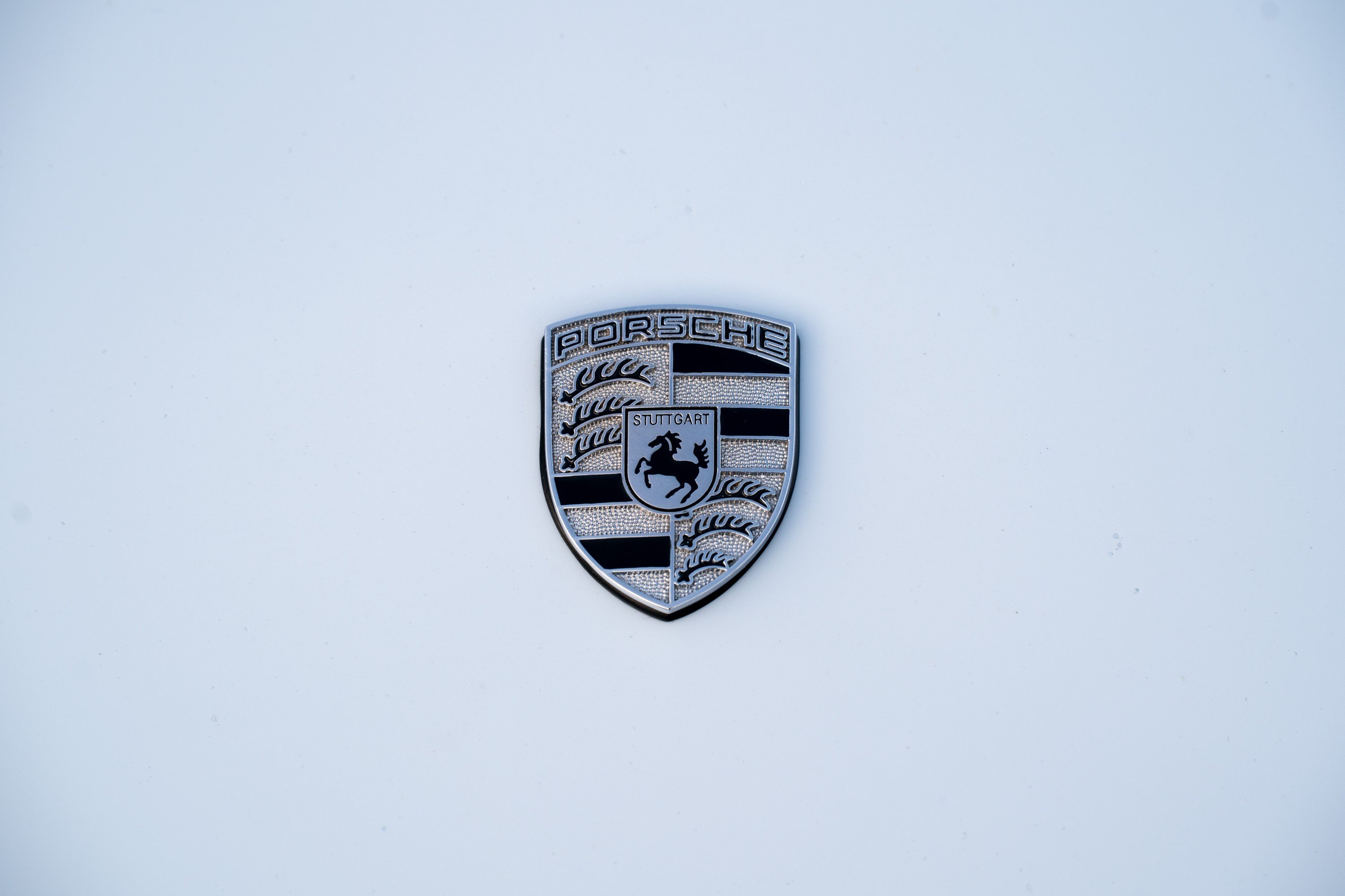 Front badge on a White Porsche 993