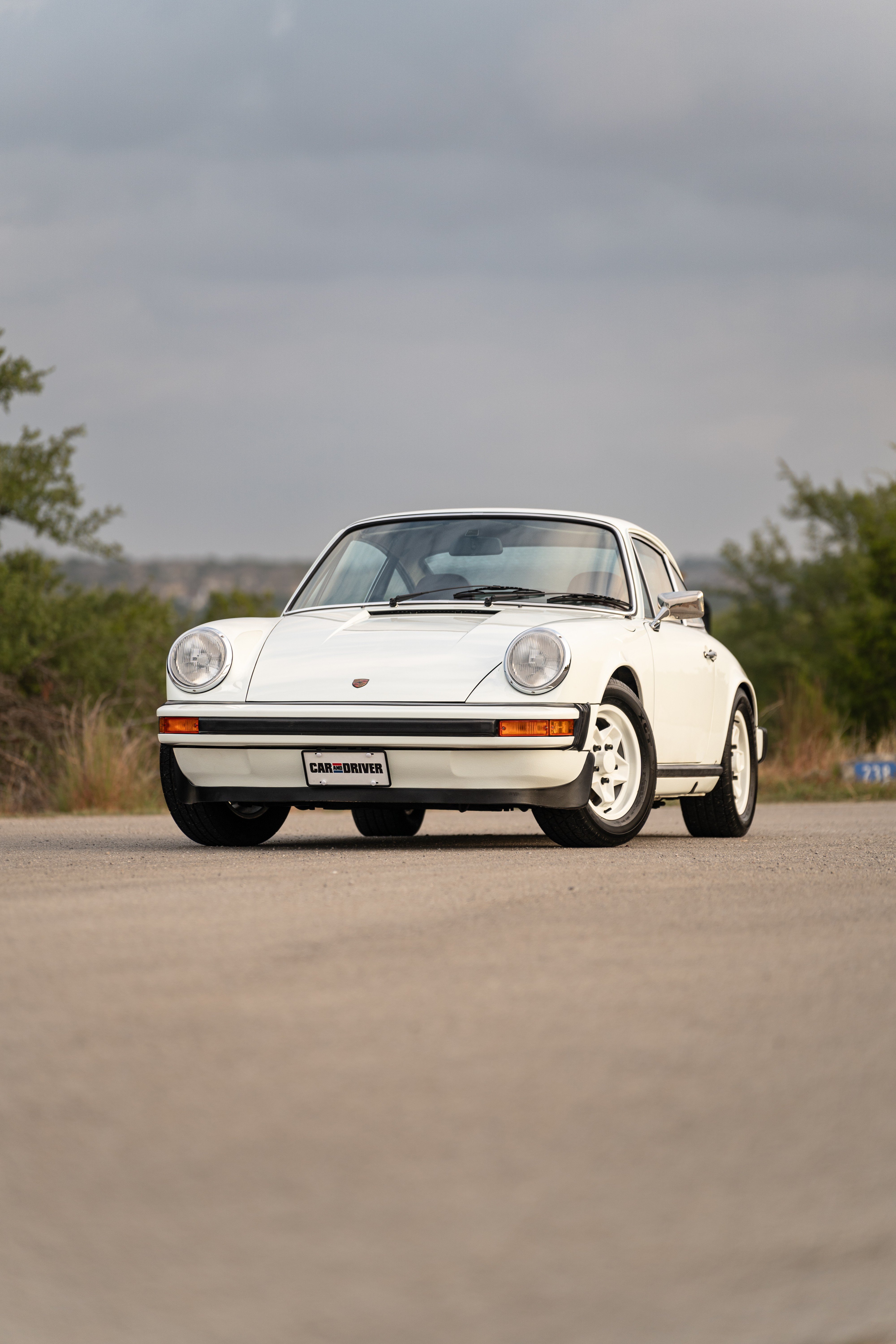 White on Red 1974 Porsche 911 Coupe 5-Speed shot in Austin, TX.