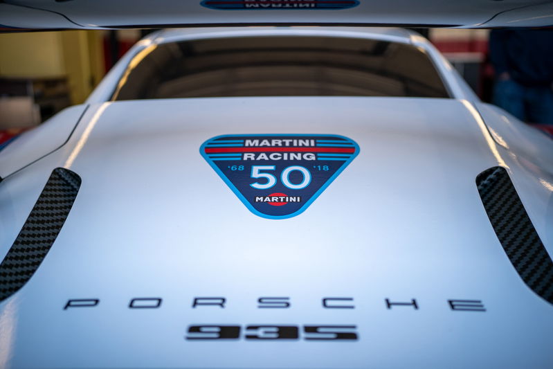 White Porsche 935 with Martini Racing 50th anniversary livery. Carbon fiber accents.