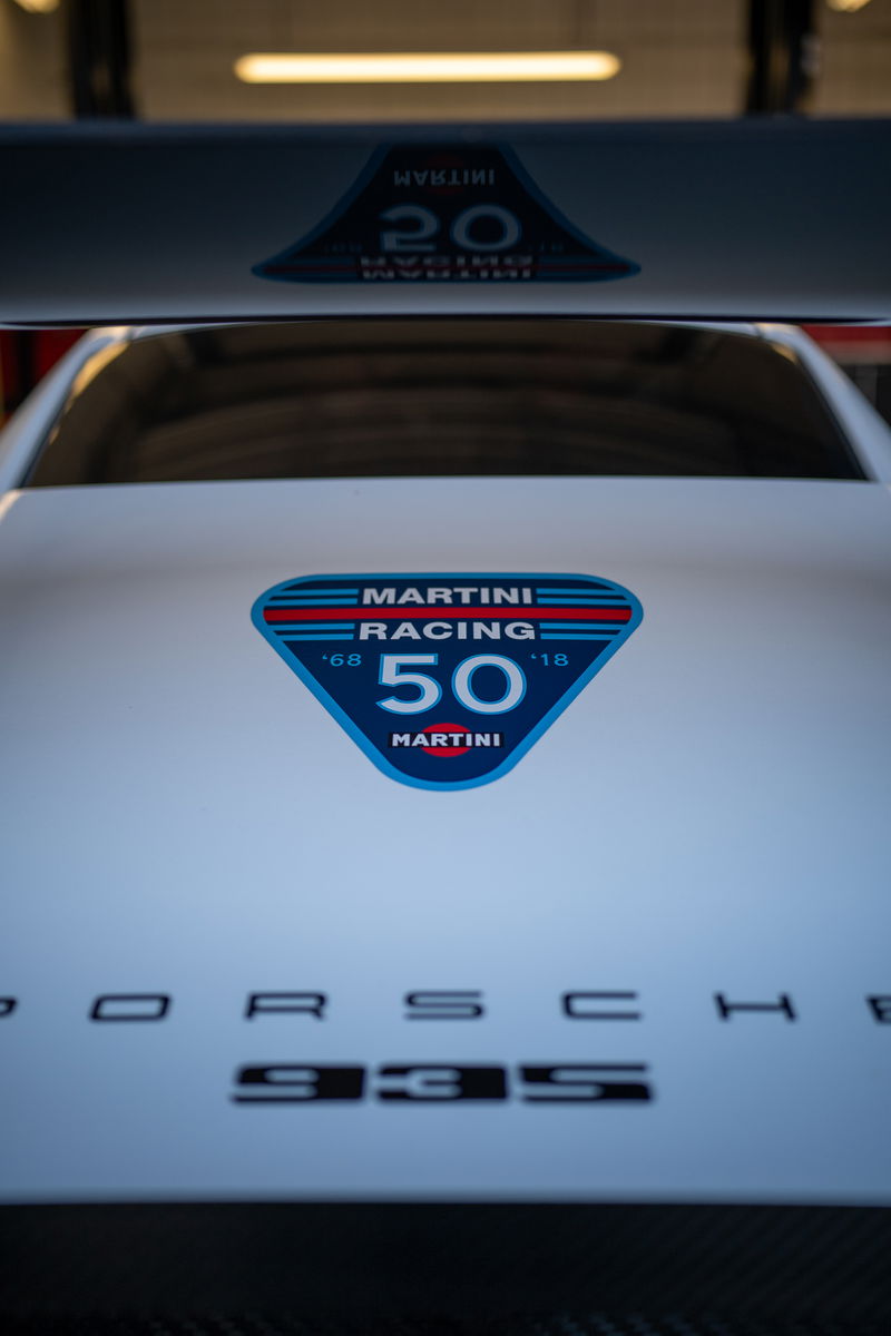 White Porsche 935 with Martini Racing 50th anniversary livery.