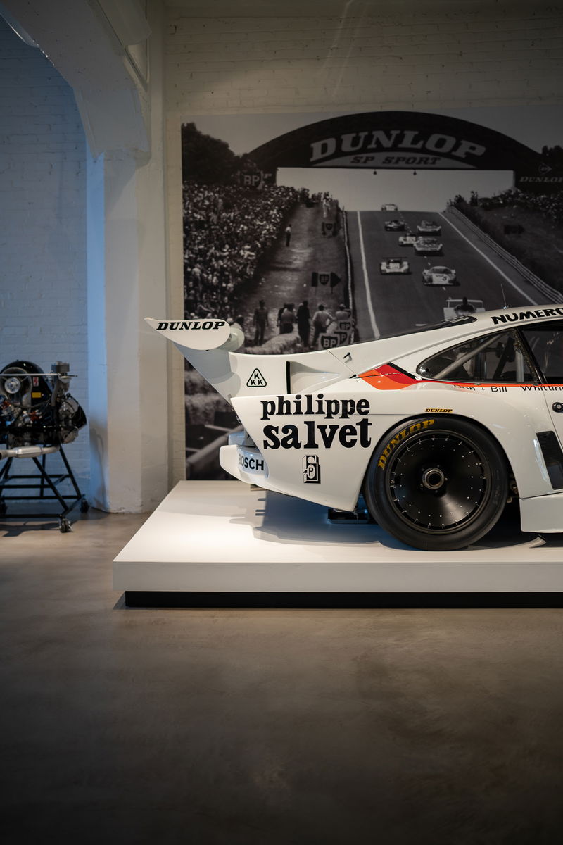 White Porsche 935 livery with "Philippe Salvat" branding and black center-lock rims.