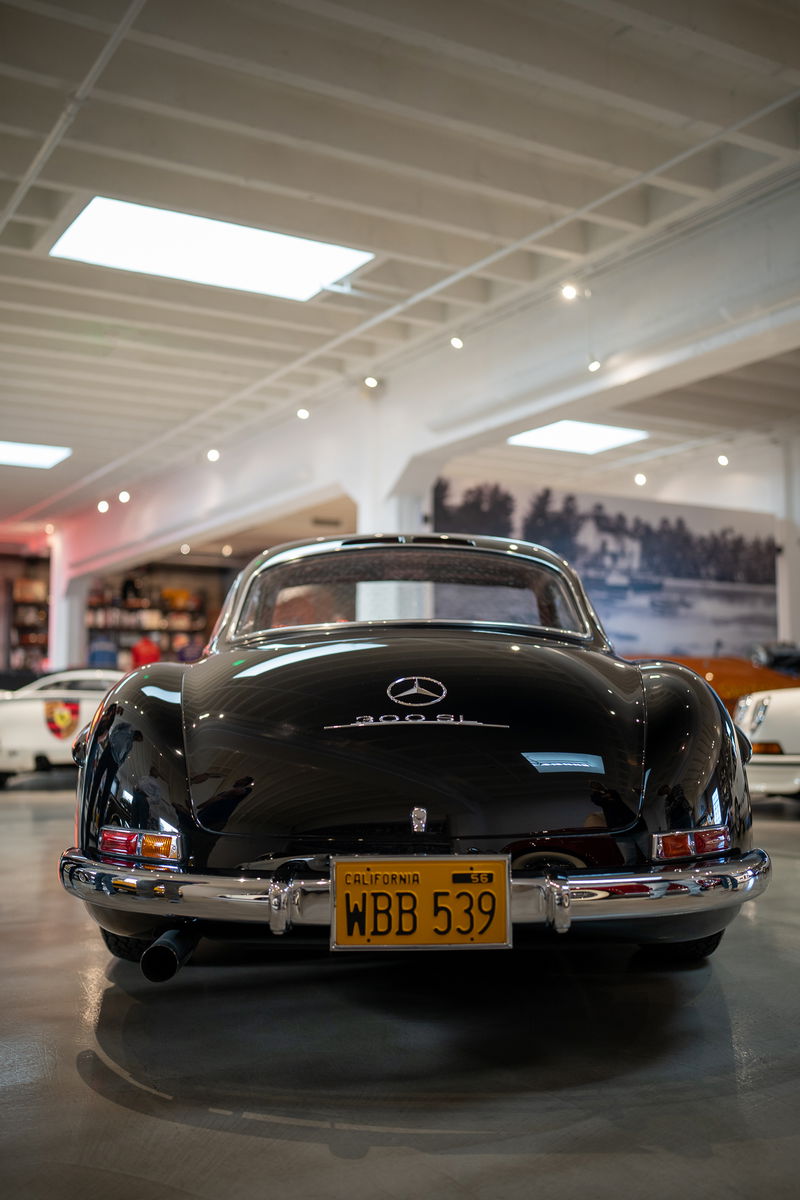 Black Mercedes-Benz 300 SL Coupe from 2022 Lit Show Los Angeles, rear view.