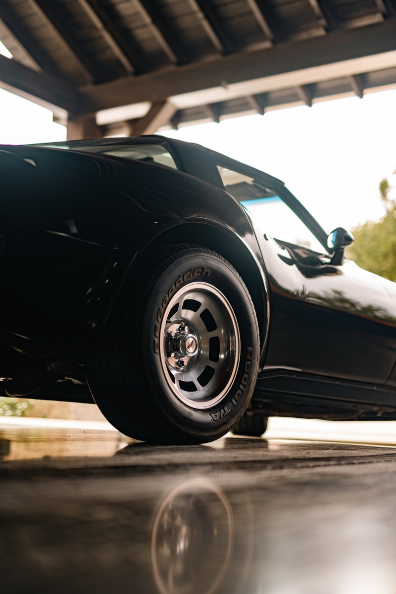 Black 1982 Corvette Stingray with classic turbine rims and BFGoodrich Radial T/A tires.
