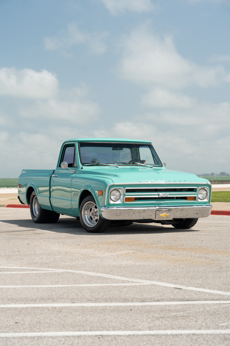 1968 Chevrolet C10 Pro-Street pickup in teal, with chrome trim and polished alloy rims.