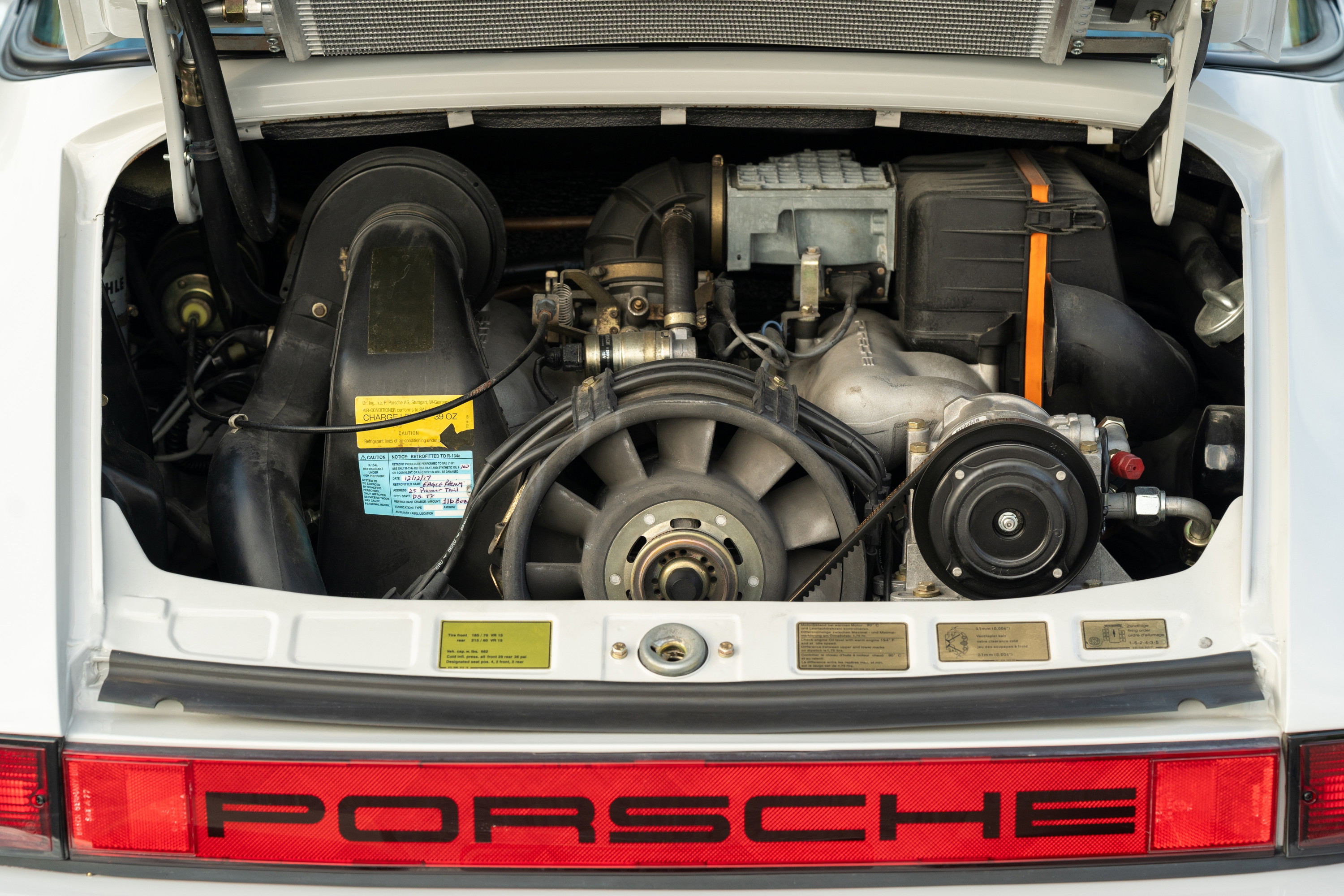 1987 Porsche 911 Carrera Targa engine bay in Marble Grey.