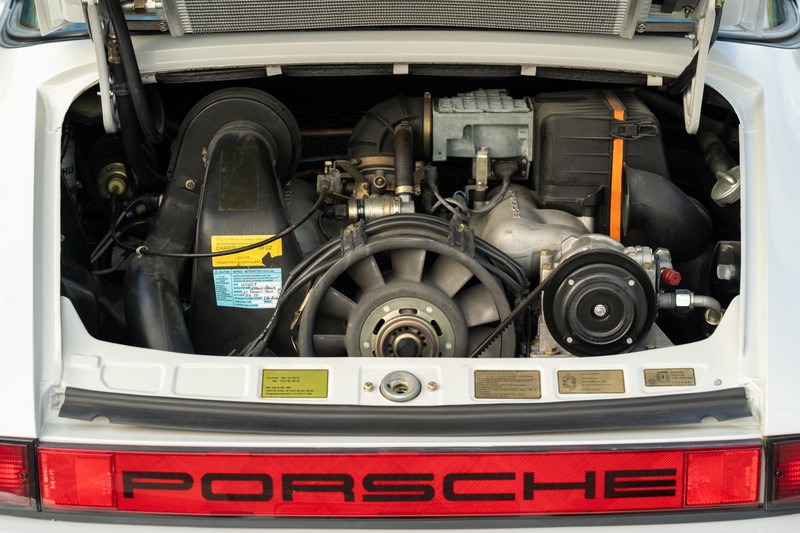 1987 Porsche 911 Carrera Targa engine bay in Marble Grey.