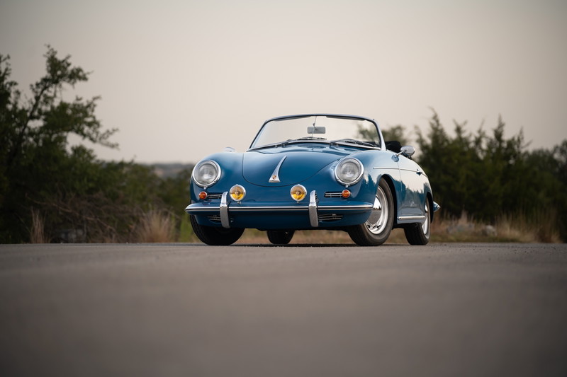 Blue 1960 Porsche 356B Roadster with chrome trim and alloy rims.