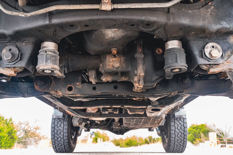Undercarriage of a 2000 Toyota 4Runner, showing the differential and suspension components.