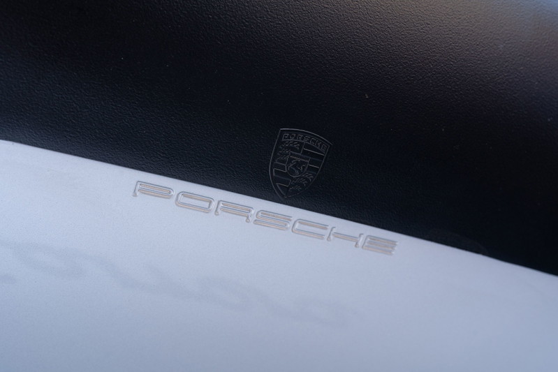 Silver 1987 Porsche 911 Carrera G50 emblem and badging.