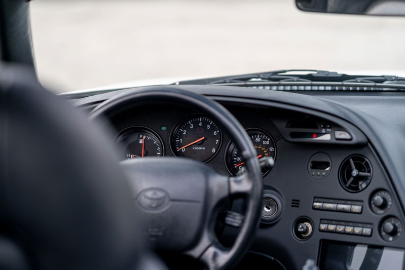 1994 Toyota Supra dashboard: speedometer, tachometer, and central console.