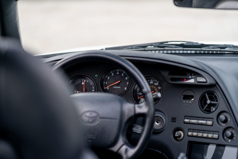 1994 Toyota Supra dashboard: speedometer, tachometer, and central console.