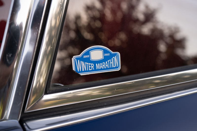 Blue 1969 Porsche 911S with a "Winter Marathon 2002" sticker on the window.