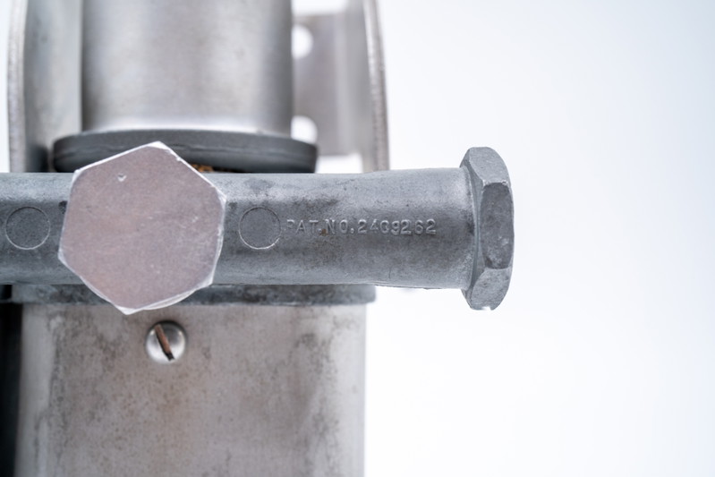 Close-up of a patent-stamped aluminum component on a new 550 Spyder.