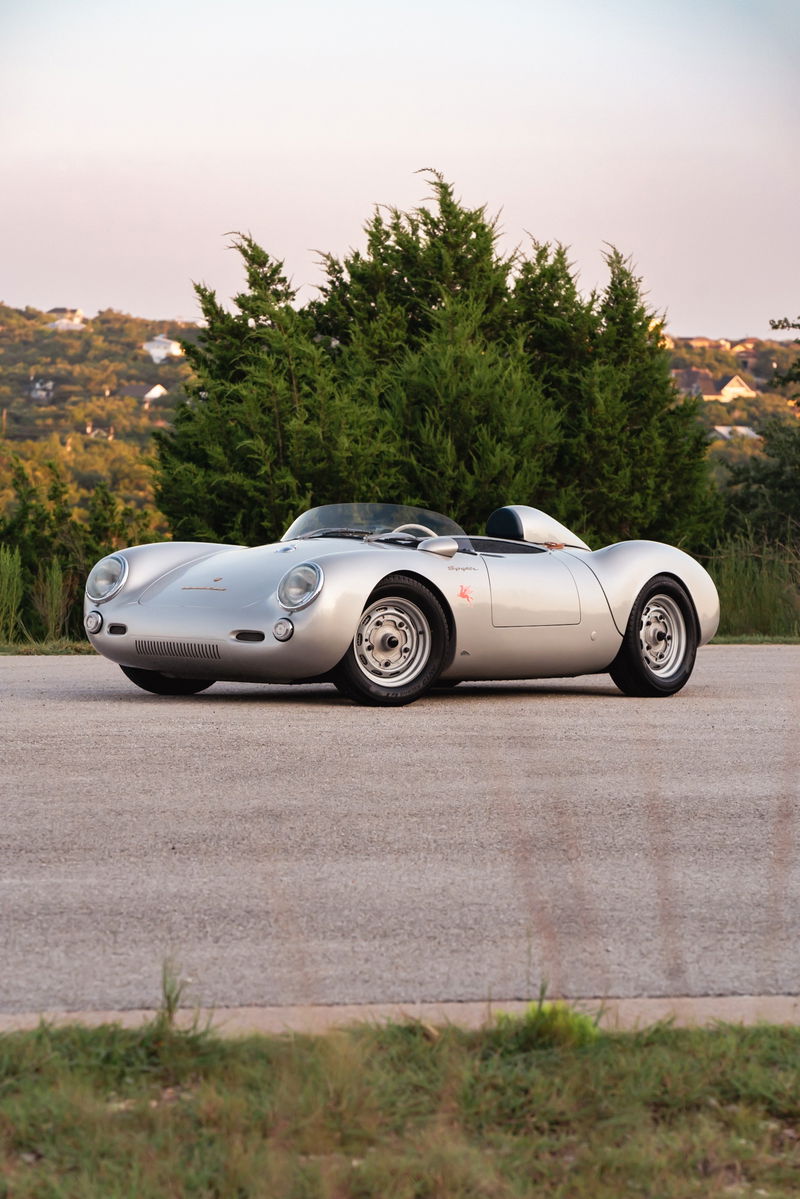 Silver Beck 550 Spyder roadster with classic racing rims and minimal trim.